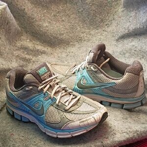 Worn Nike 7.5 Women's Pegasus 27 Tan and Blue Used Athletic Shoes